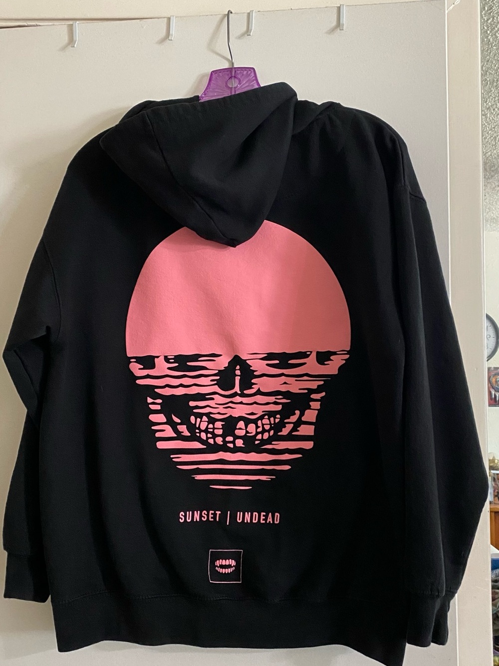 Chomp Sunset Undead Men's Black Hoodie with Pink Skull Graphic